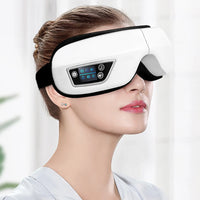 Heated eye massager folded for travel